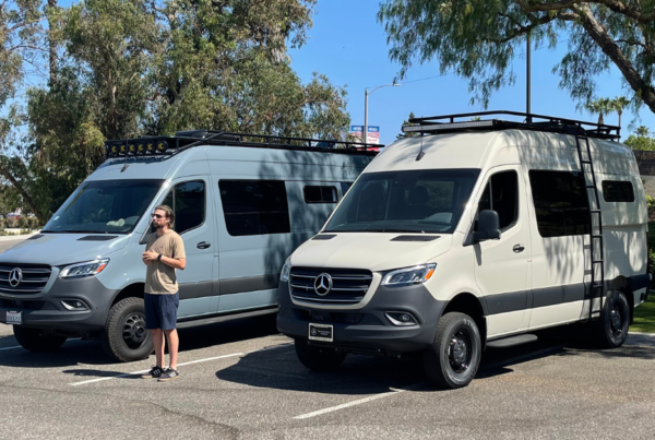 a 2wd and 4wd drive sprinter vans parked next to one another